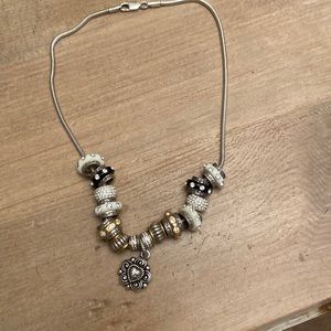 Pandora necklace with 15 charms.
